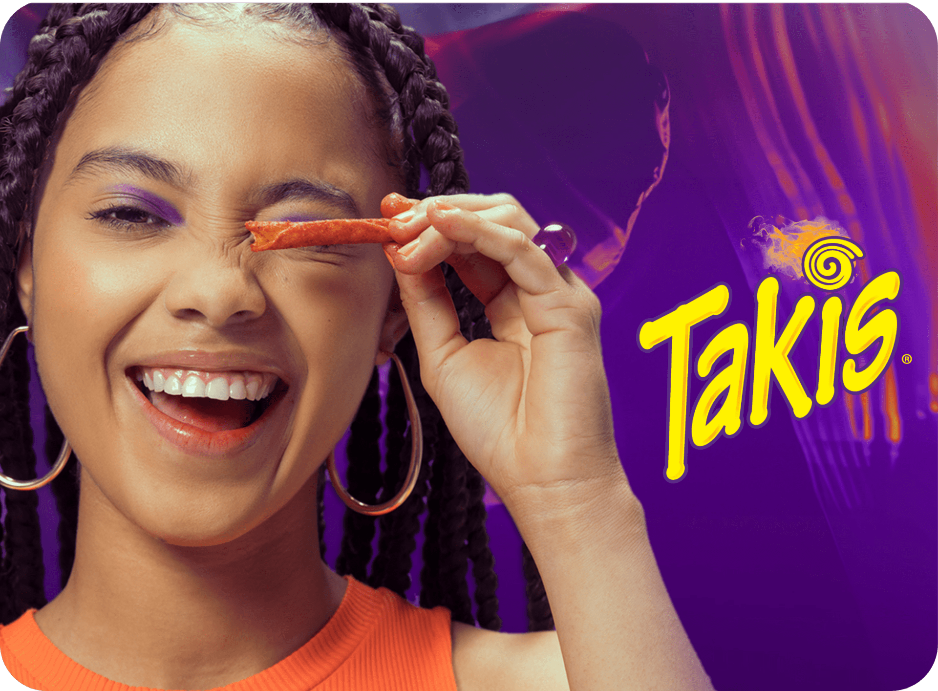 Smiling woman with Takis logo and purple background – lifestyle image for Takis NZ brand by Zebra International