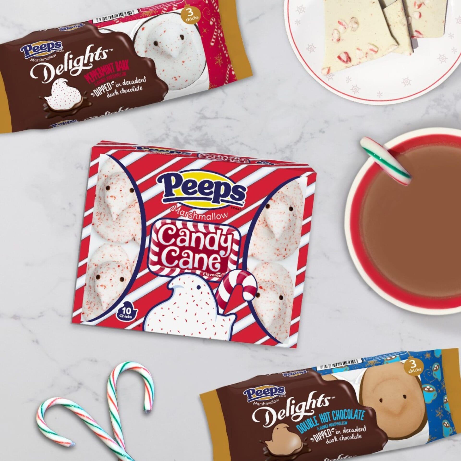 Peeps Christmas marshmallow candy packs with candy cane and gingerbread designs, imported from the USA by Zebra International.